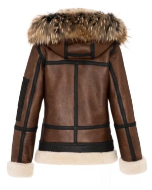 Kożuch damski w brązowym kolorze z futrzanym kapturem i skórzanymi detalami na rękawach