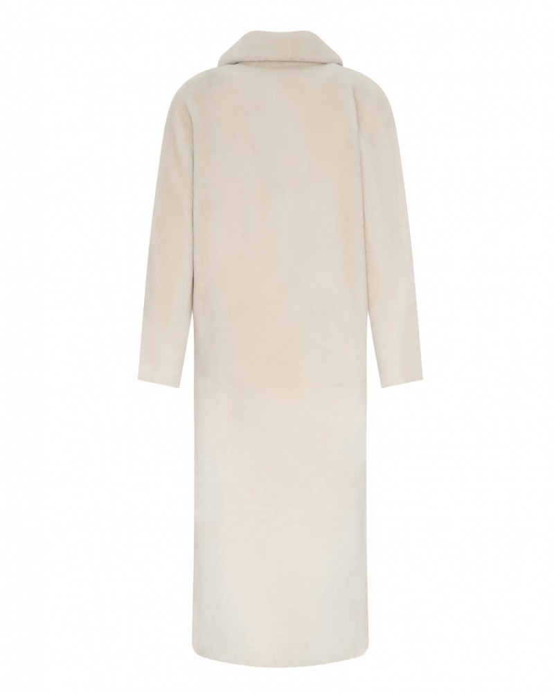 Kożuch damski w jasnym odcieniu, długi krój z klasycznym kołnierzem i prostymi rękawami